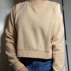 light pink sweater